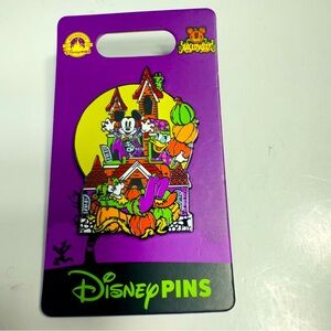 NWT. Disney pin. Mickey Mouse and Friends Halloween Glow-in-the-Dark Pin.
